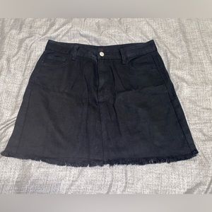 Black denim mini skirt